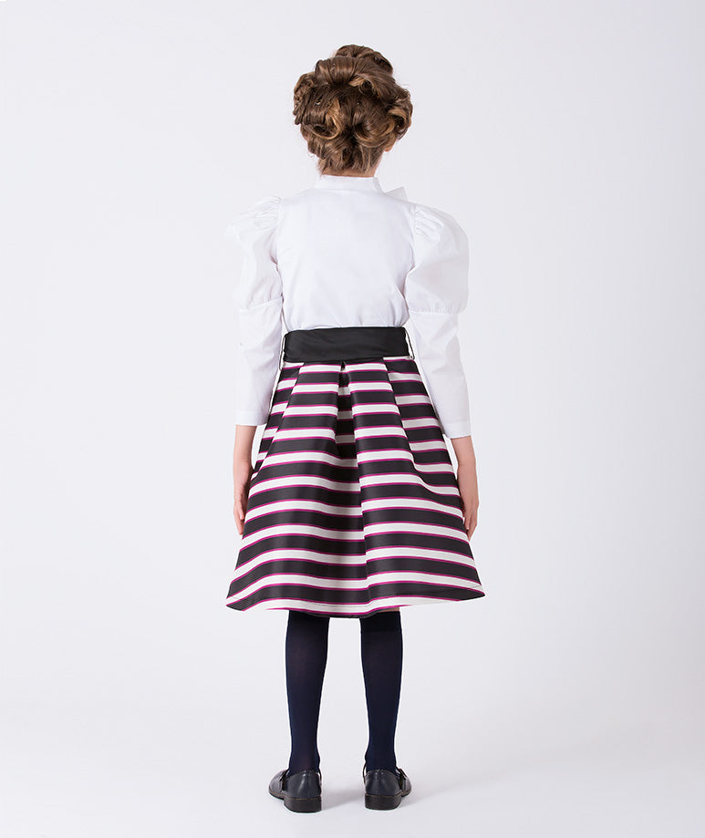 a white bow-tied blouse