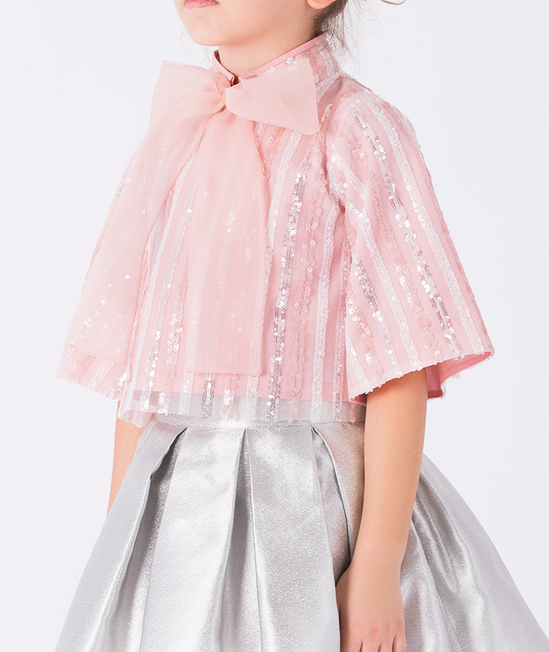 glittery striped pink blouse with wide sleeves and a silver mini skirt