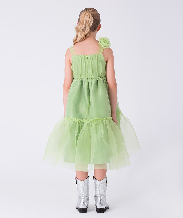 Back view of an organza girls dress with 3D shoulder detail by Mama Luma, designed for refined special occasions and comfortable wear for ages 3–12.