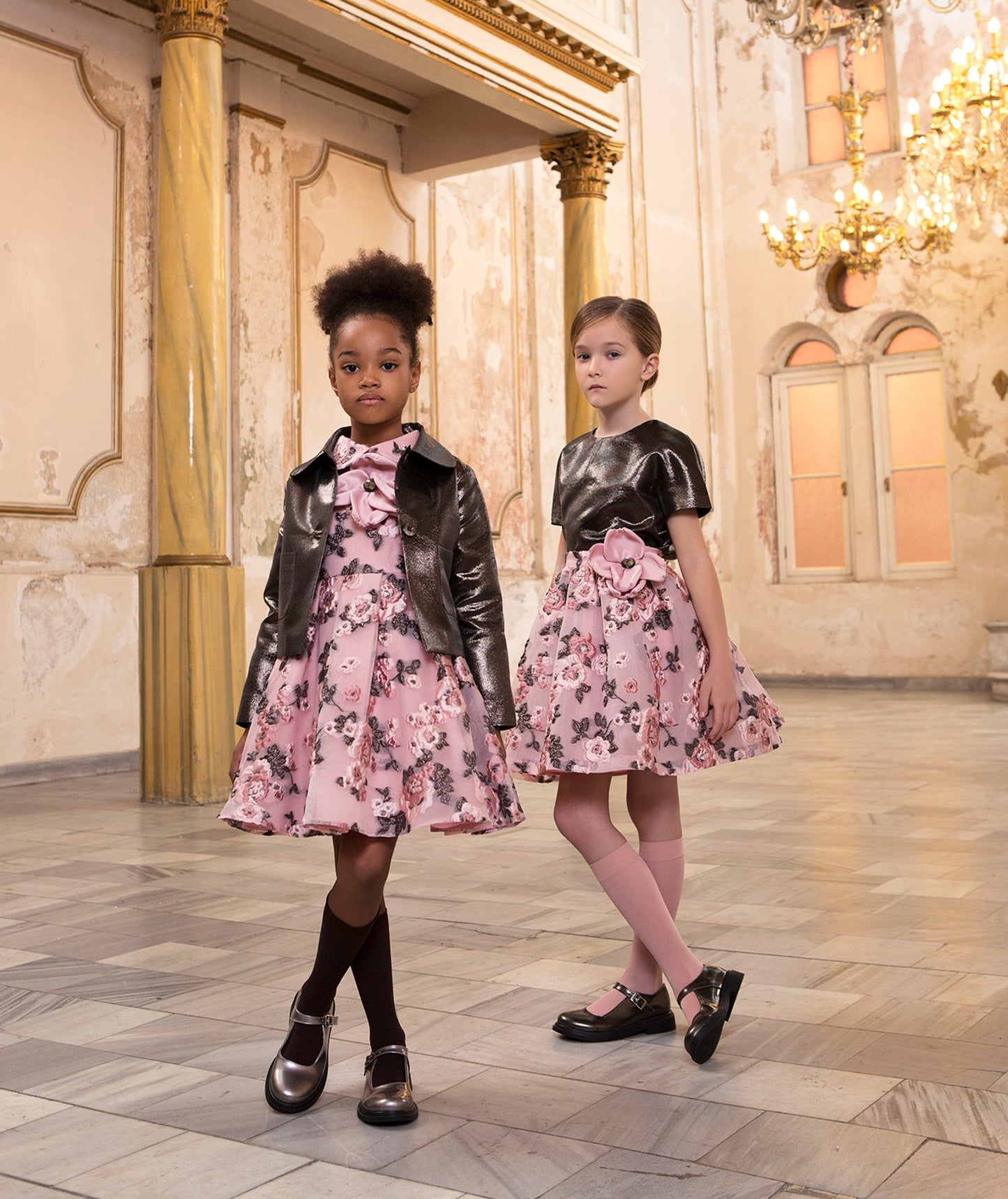 metallic bronze jacket, pink dress with a 3D flower detail and brown flower embroidery, metallic bronze blouse and pink floral embroidered skirt with a 3D flower on the waist