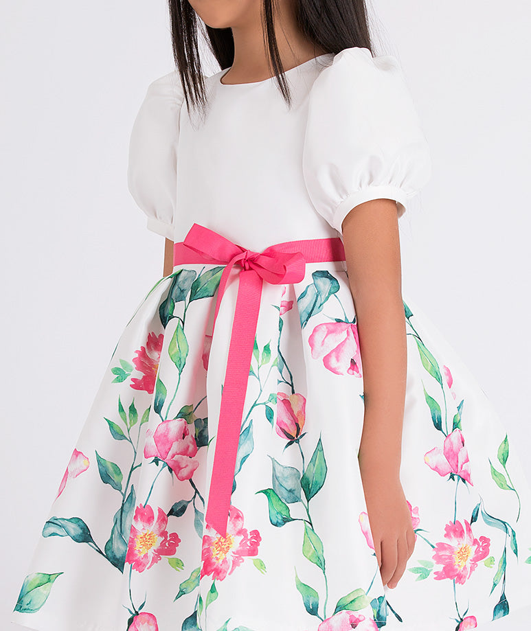 white balloon sleeved floral dress with a pink bow belt