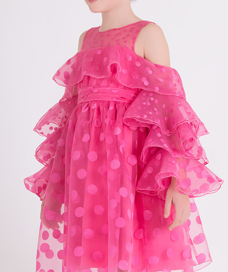 pink ruffled dress with polka dots
