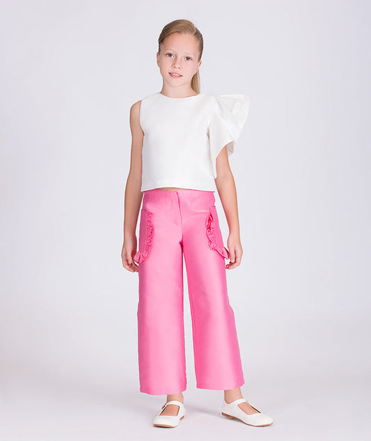 white ruffled sleeve blouse and pink pants with ruffled pockets