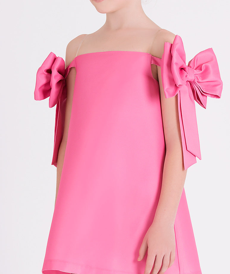 pink dress with big bow sleeves
