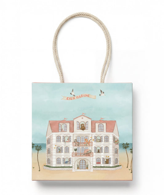 Gift bag with a house illustration and 'Casa Darlin' text on a white background