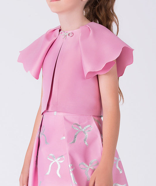 Pink dress with ruffled shoulders on a white background