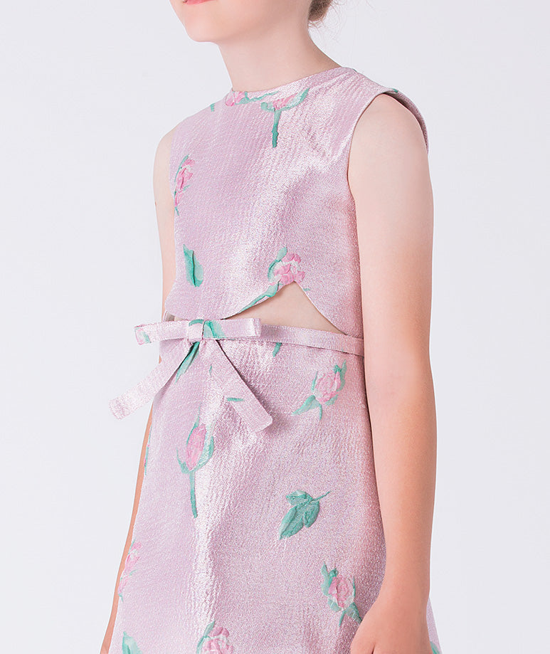 Pink floral dress with cut-out design on a white background
