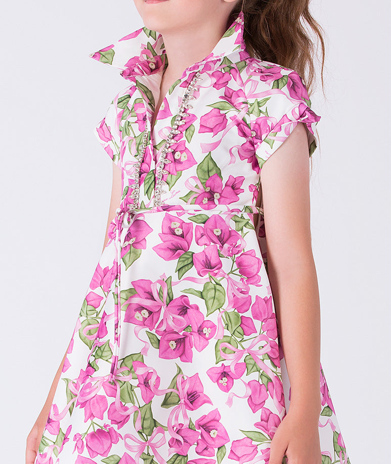 Luxury girls occasion dress featuring pink bougainvillea floral print with crystal-trim detailing on the bodice, sleeveless design and structured silhouette, created for elegant special occasions