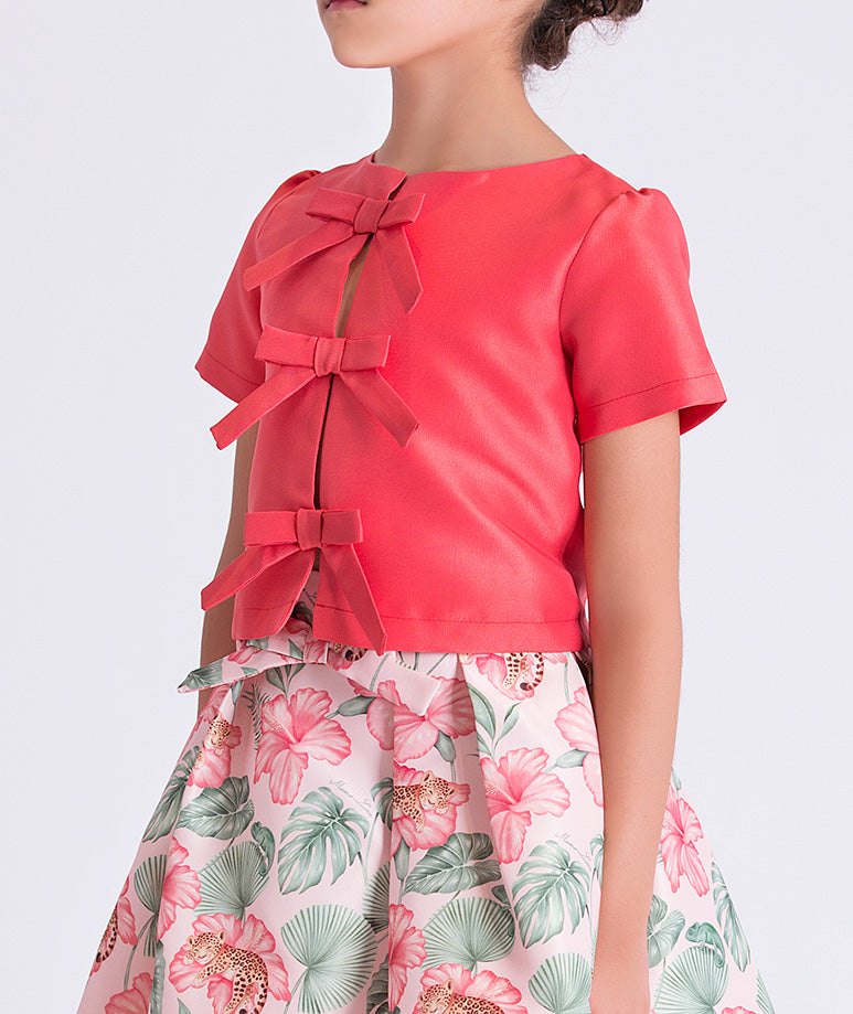 Close-up detail of the Bow Enchanted Girls Outfit highlighting the decorative bow accents and premium lightweight woven fabric of the top, fully cotton lined for comfort, ideal for festive events and celebrations for ages 3–12.