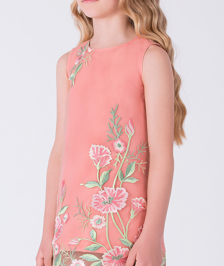 Close-up detail of the Embroidered Floral Girls Dress highlighting the intricate floral embroidery on premium lightweight woven fabric, fully cotton lined for comfort, ideal for festive events and elegant celebrations for ages 3–12.