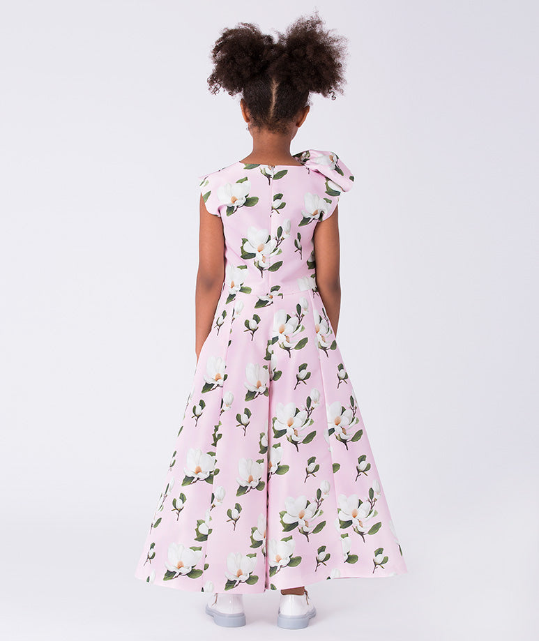 back of girls pink two-piece floral outfit with ruffle detail top and flowing wide-leg pants by Mama Luma