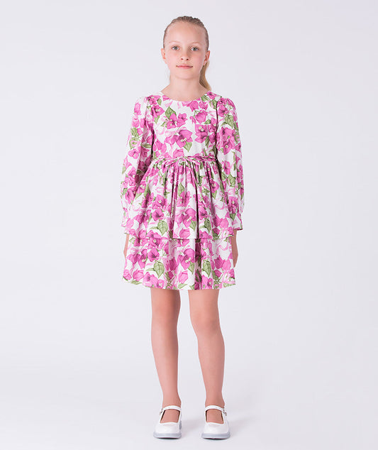Flowy bougainvillea girls dress with floral print, long sleeves and softly flared skirt, designed for special occasions and celebrations