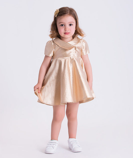 Front view of Golden Amara metallic gold baby girls dress with flared skirt and structured neckline for special occasions