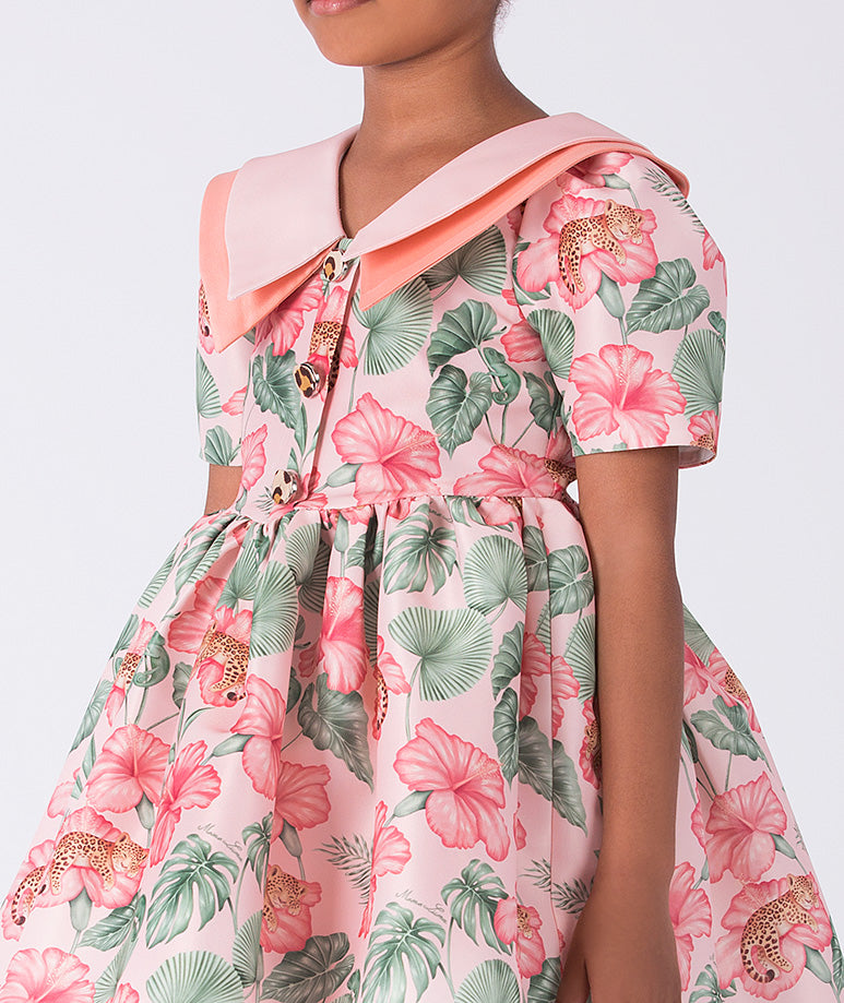 Close-up detail of the Mahe Lotus Floral Girls Dress highlighting the lotus-inspired floral print, soft pink Peter Pan collar, and premium lightweight woven fabric texture, fully cotton lined and ideal for festive events, family photos, and elegant celebrations for ages 3–12.