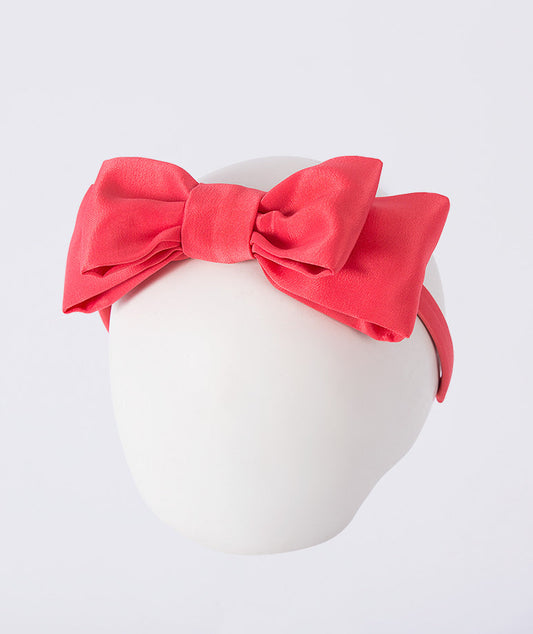 Mahe Lotus Red Bow Headband featuring a structured red bow crafted from premium lightweight fabric, designed as an elegant hair accessory for birthdays, holidays, weddings, and special occasions.