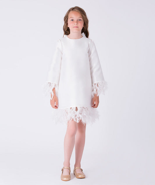 Front view of ivory girls dress with feather trim hem and cuffs, long sleeves and elegant A-line silhouette.