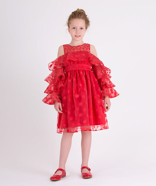 red dress with ruffled sleeves and polka dots