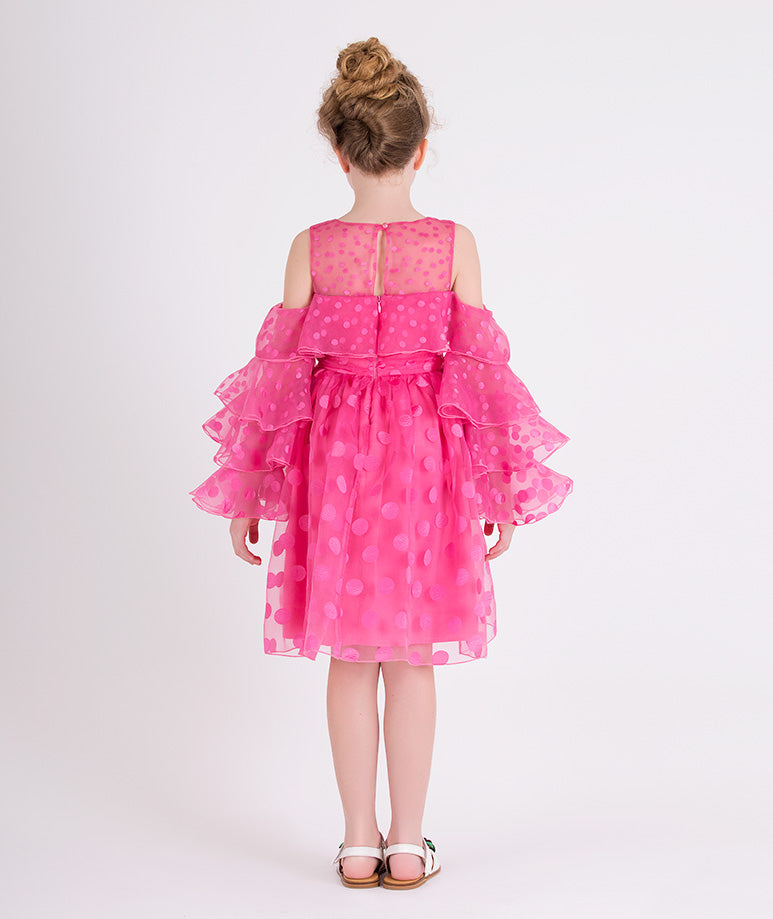 pink dress with ruffled sleeved and polka dots