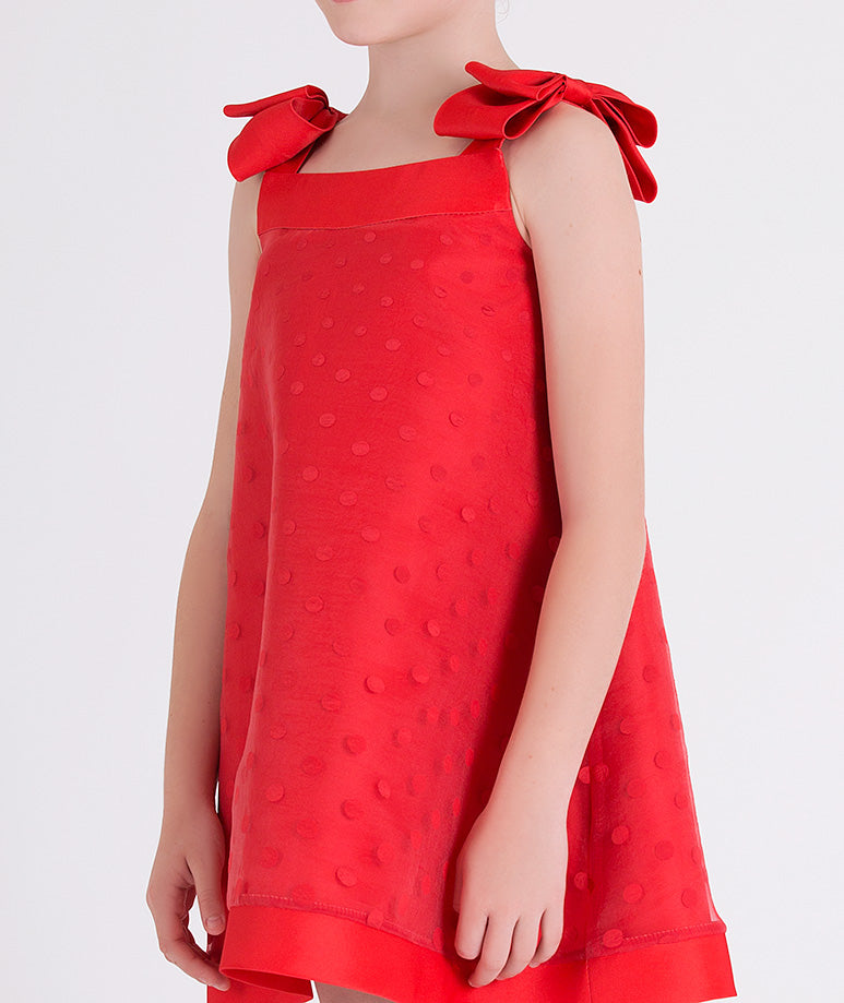 red polka dot dress with bow shoulders