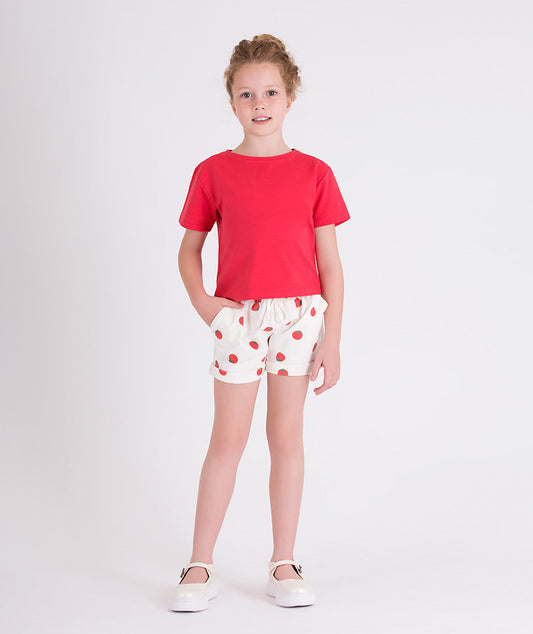 red tshirt and white shorts with tomato prints
