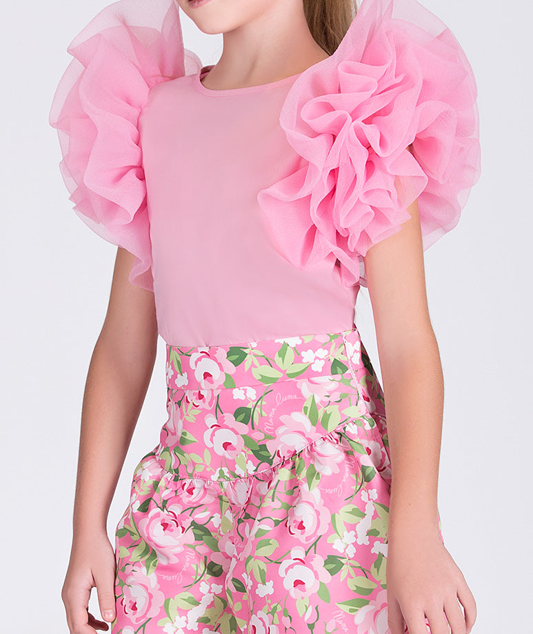 pink blouse with ruffled sleeves and floral flowy pants