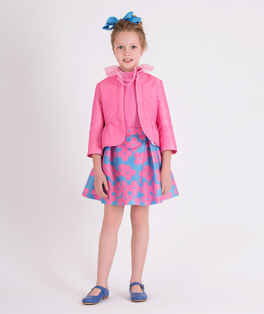 pink jacket, ruffled blouse and blue skirt with pink flower prints