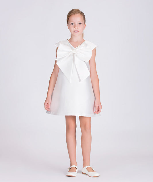 white summer dress with a big bow on the front 