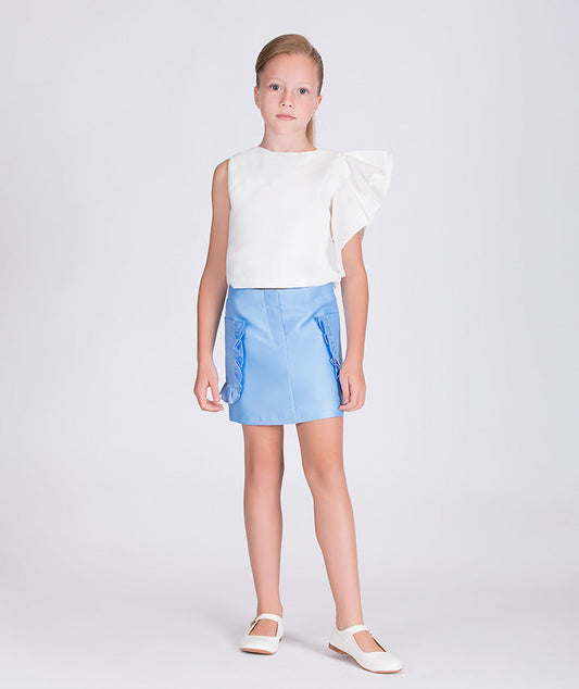 white ruffled sleeve blouse and blue skirt with ruffled pockets