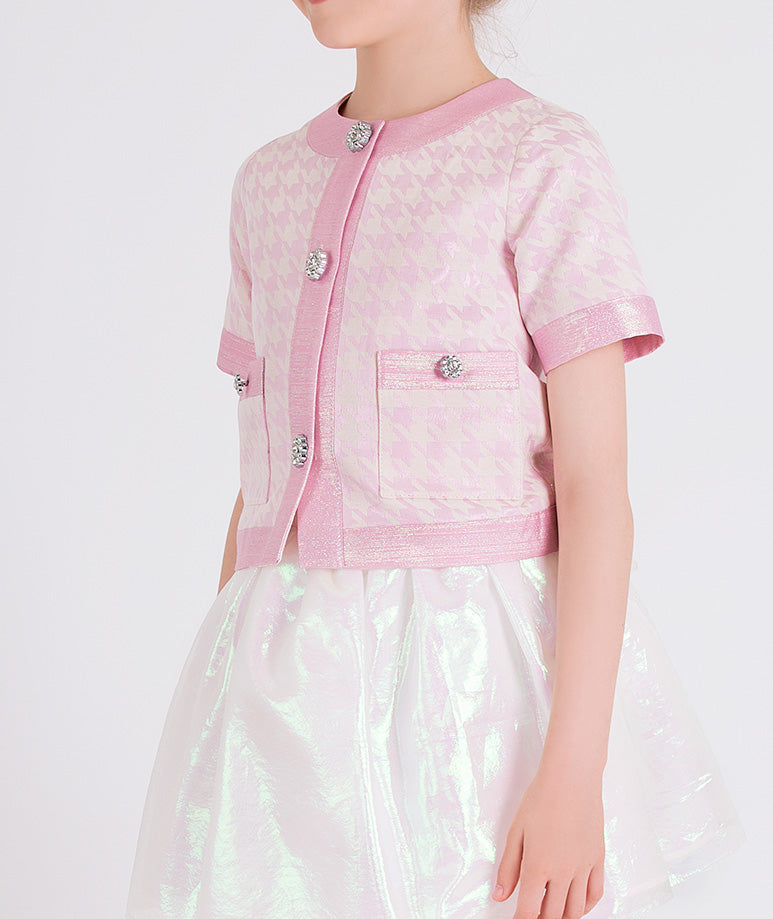 pink houndstooth jacket with sparkling buttons and white jacquard skirt