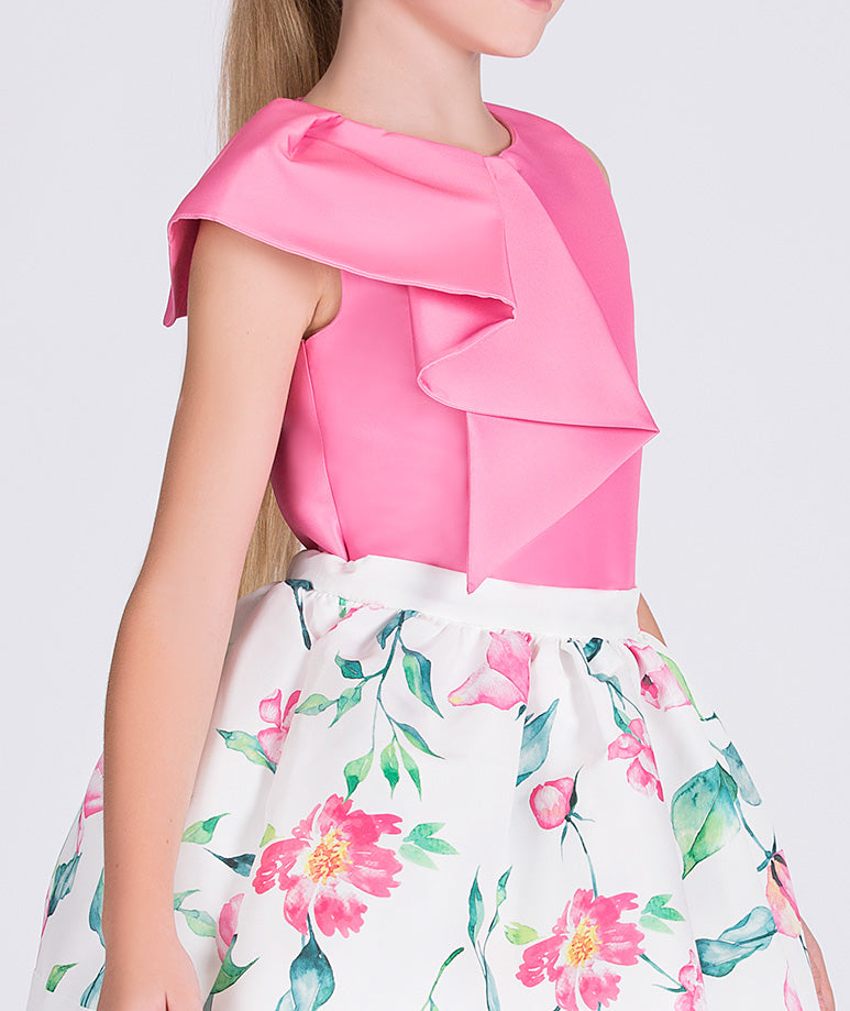 pink blouse and white floral skirt