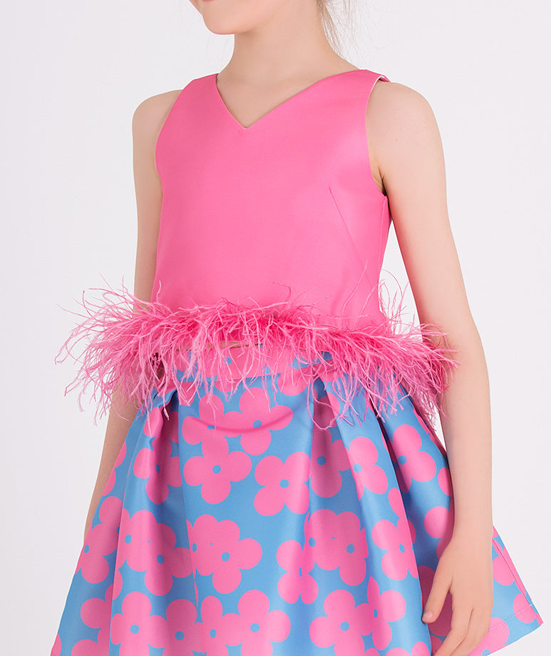 pink feathered blouse and blue skirt with pink flowers