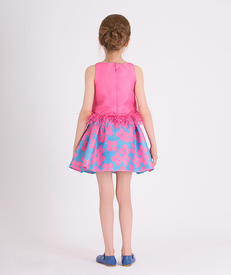 pink feathered blouse and blue skirt with pink flowers
