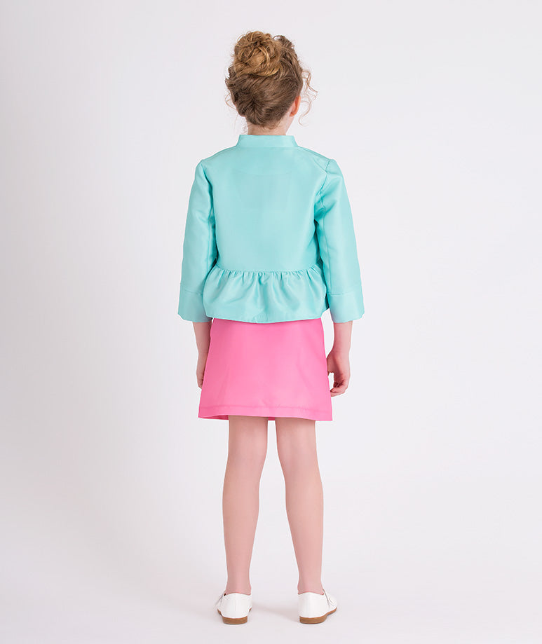 mint jacket and pink skirt