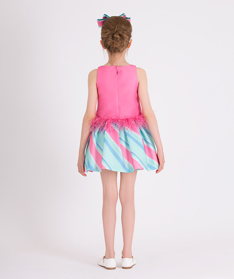 pink blouse with feathery waist, blue and pink striped skirt