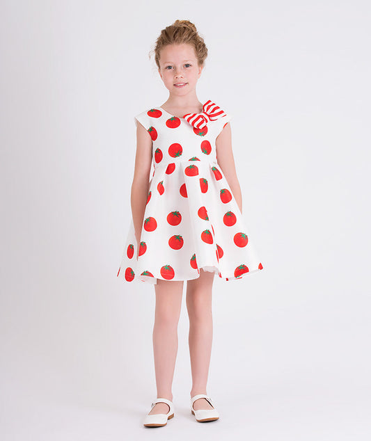 cute ecru summer dress with tomato prints and red and white striped bow on the front